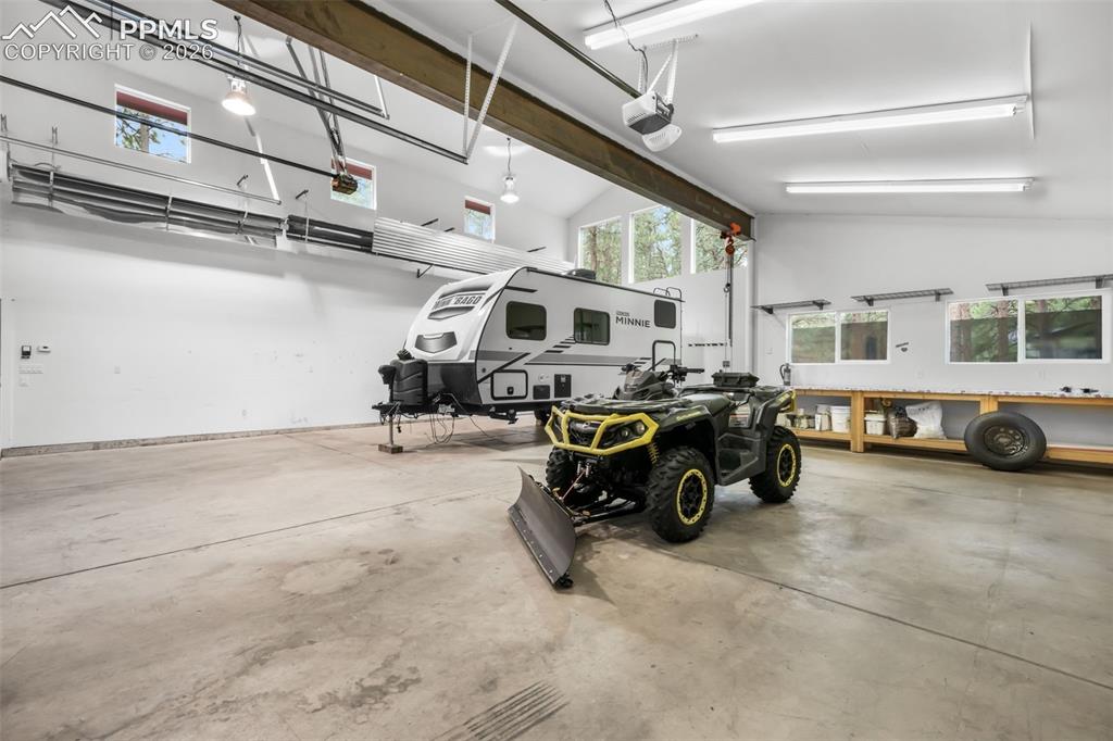 19010 Deerfield Road Monument, CO 80132 - Photo 46 of 50 a car is parked in a parking garage
