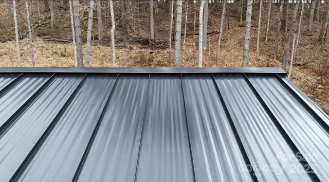 a view of backyard with glass door