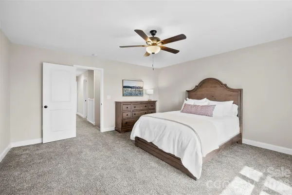 a bedroom with a bed and closet
