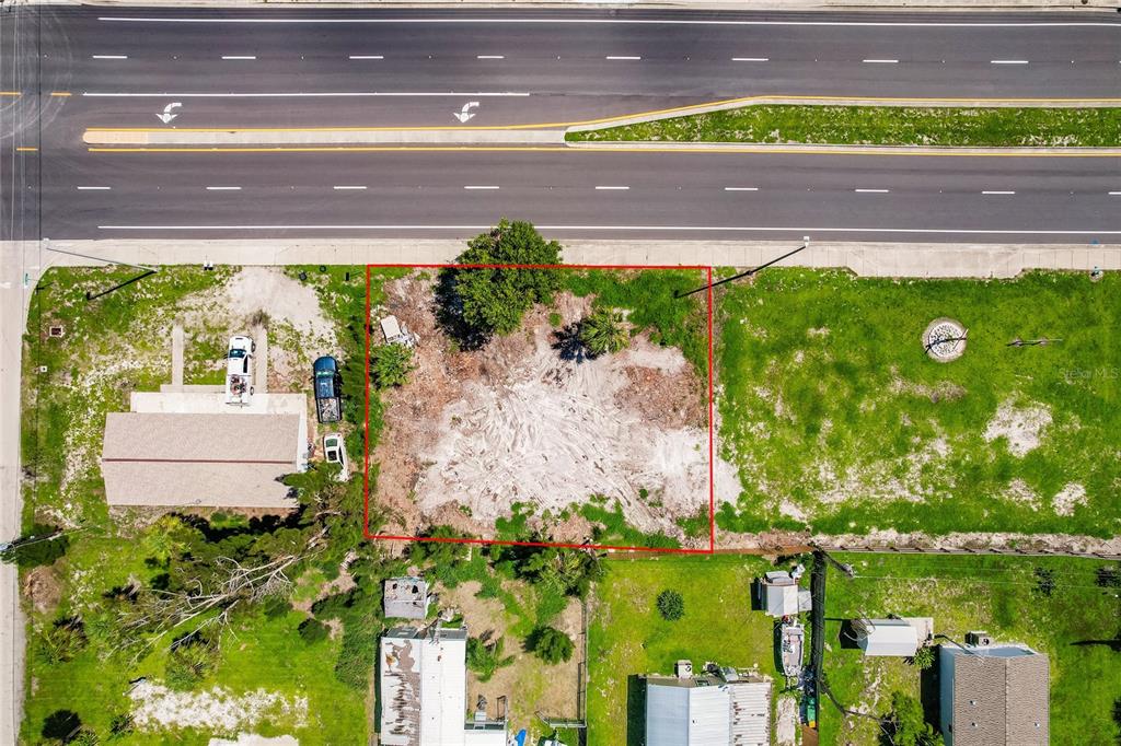 3220 Placida Road Englewood, FL 34224 - Photo 7 of 8 a view of a yard with an outdoor space