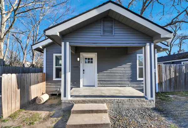 a front view of a house with a balcony
