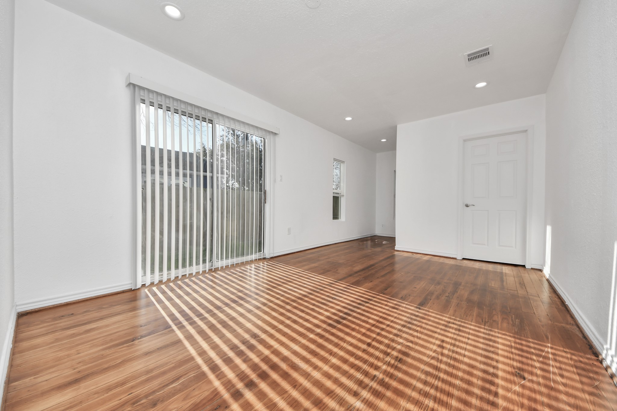 3423 Beulah Street Houston, TX 77004 - Photo 20 of 36 a view of a livingroom with wooden floor