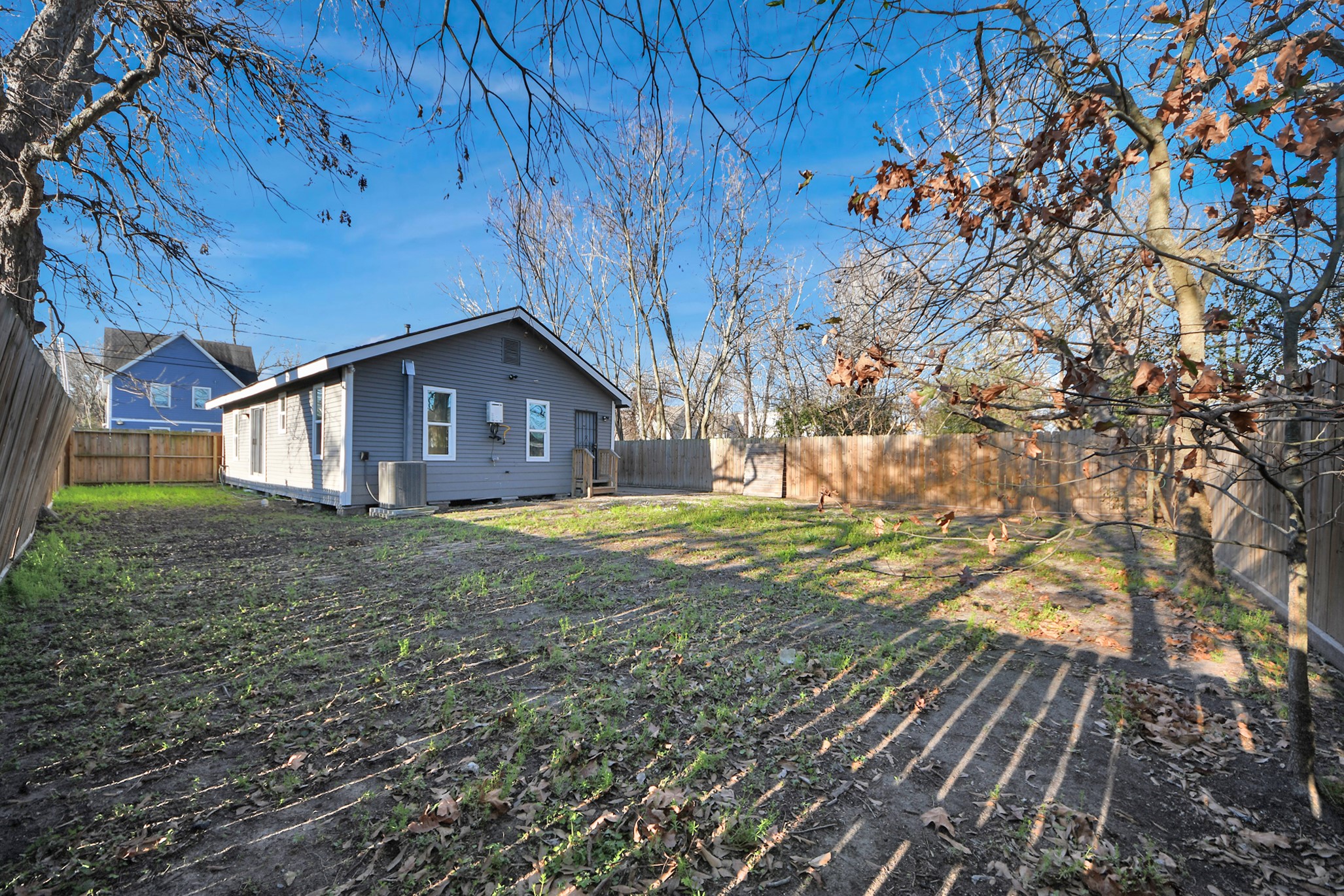 3423 Beulah Street Houston, TX 77004 - Photo 28 of 36 a view of a house with a yard