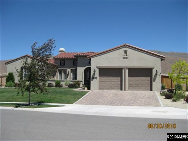 8549 Timaru Trail Reno, NV 89523 - Photo 1 of 9 a front view of a house with a yard