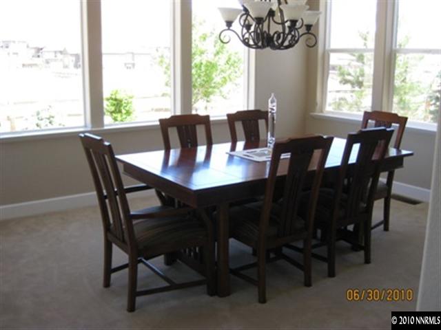 8549 Timaru Trail Reno, NV 89523 - Photo 2 of 9 a dining room with furniture and window