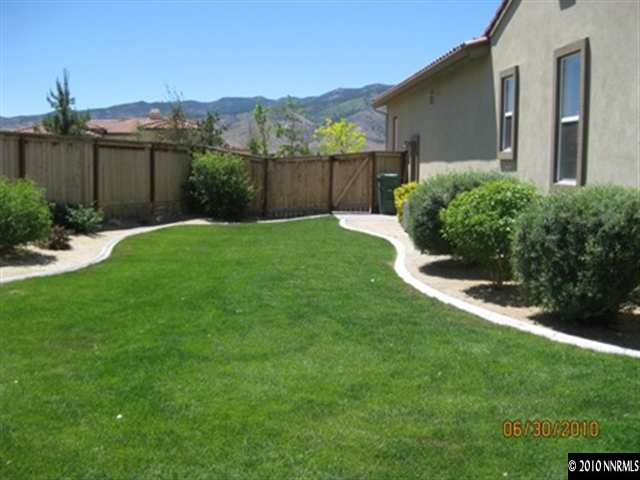 8549 Timaru Trail Reno, NV 89523 - Photo 8 of 9 a view of a back yard