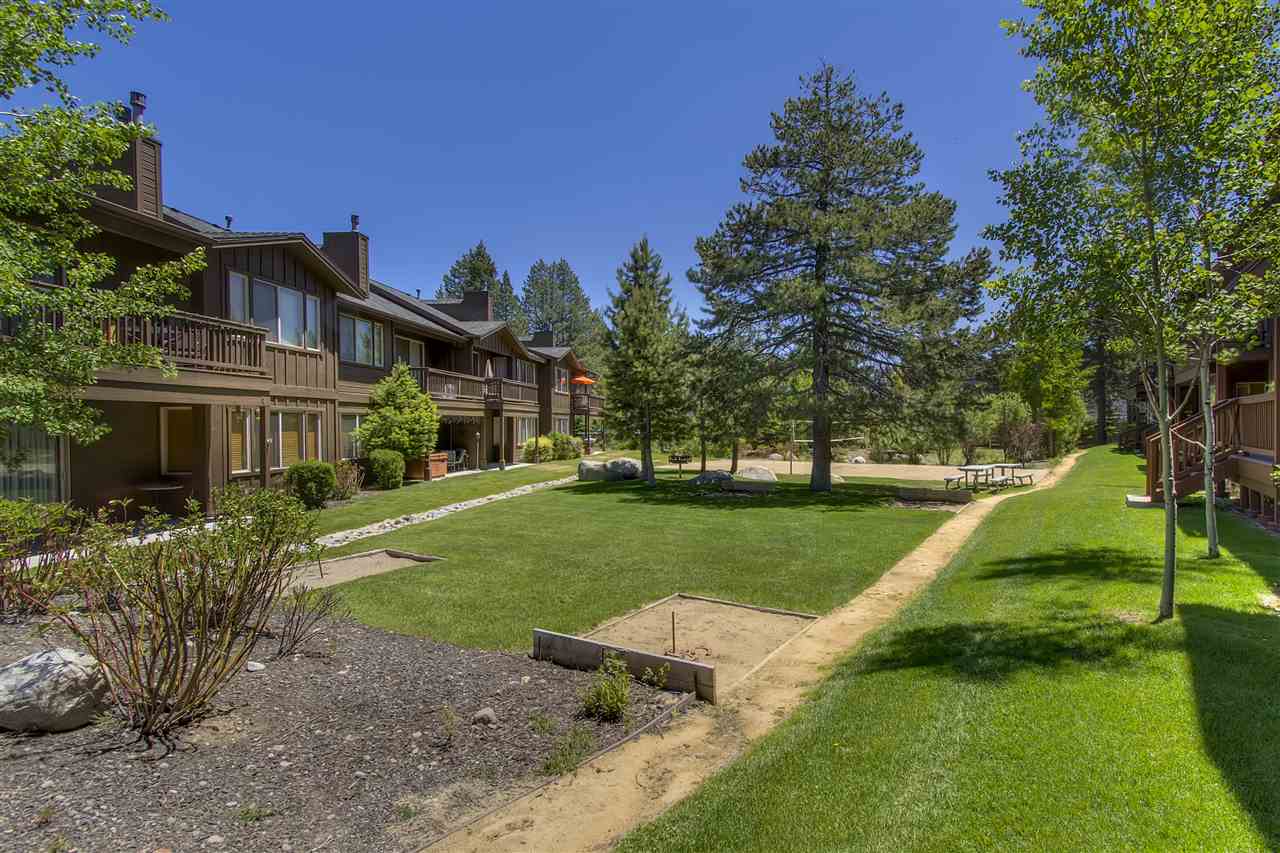 11679 McClintock Loop, Unit 1 Truckee, CA 96161 - Photo 17 of 19 a front view of a house with a yard