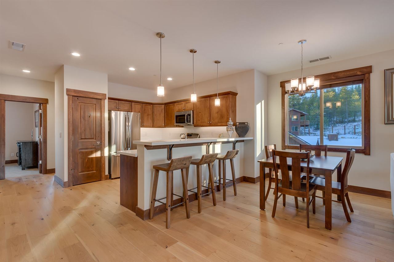 11679 McClintock Loop, Unit 1 Truckee, CA 96161 - Photo 2 of 19 a view of a dining room with furniture window and outside view