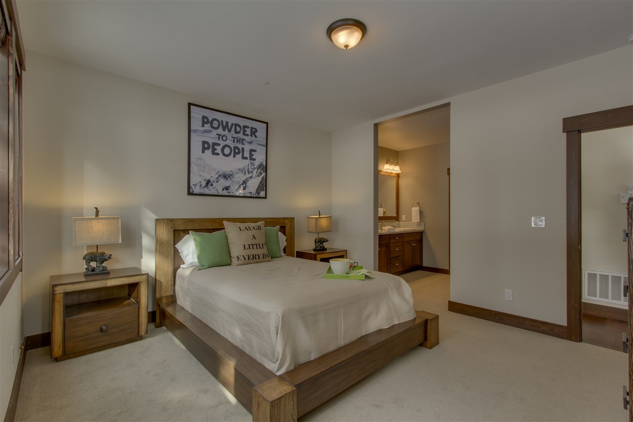 11679 McClintock Loop, Unit 1 Truckee, CA 96161 - Photo 6 of 19 a bedroom with a bed and a lamp