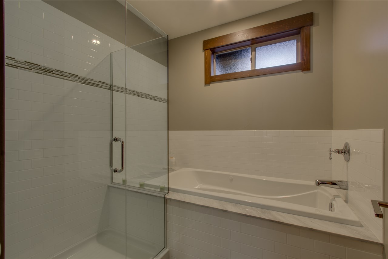 11679 McClintock Loop, Unit 1 Truckee, CA 96161 - Photo 8 of 19 a bathroom with a bathtub and a shower