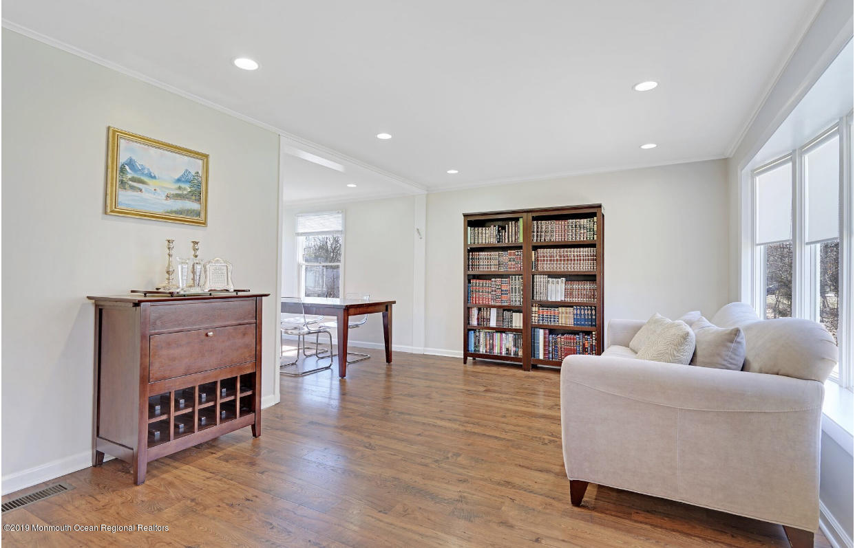 219 Jackson Pines Road Jackson, NJ 08527 - Photo 15 of 26 a living room with furniture and a flat screen tv