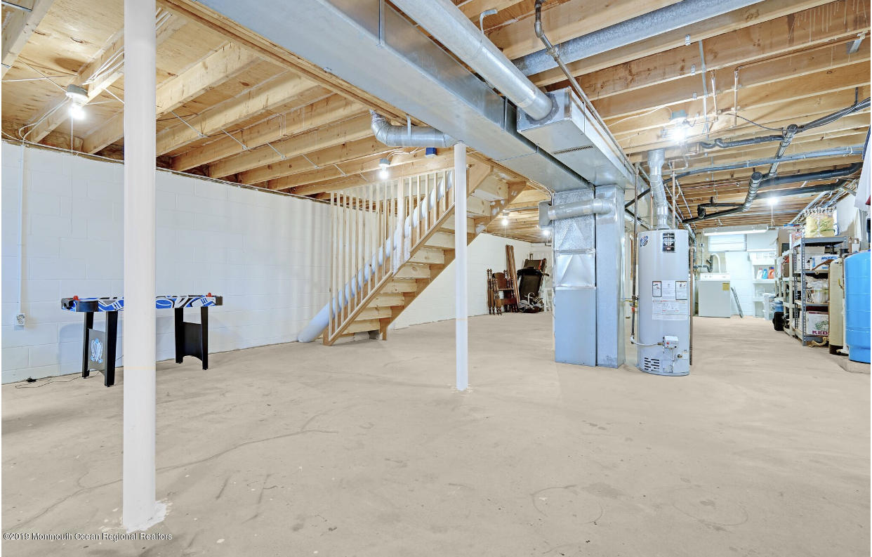 219 Jackson Pines Road Jackson, NJ 08527 - Photo 20 of 26 a view of an empty room with stairs