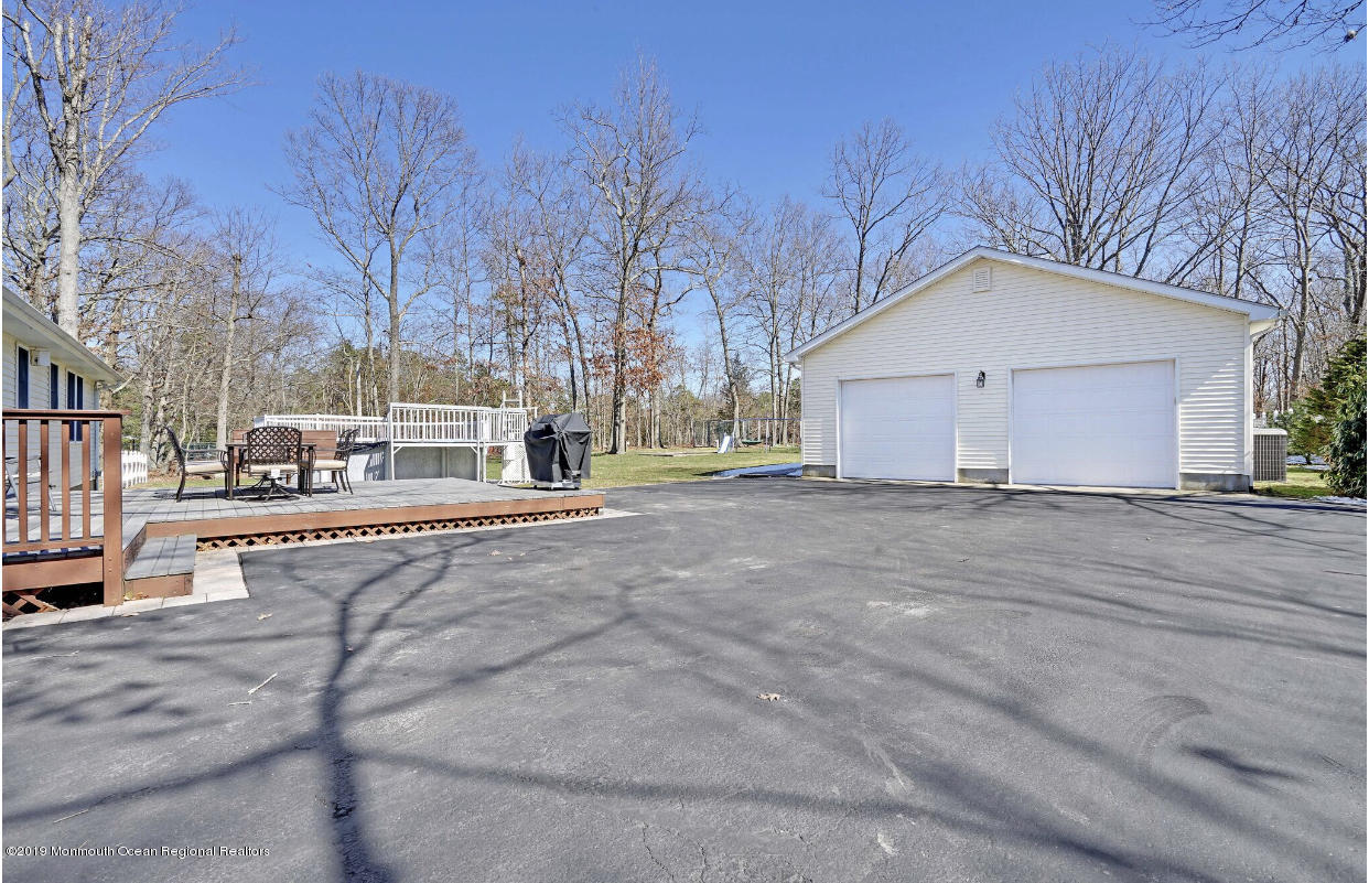 219 Jackson Pines Road Jackson, NJ 08527 - Photo 22 of 26 a view of large space with a street