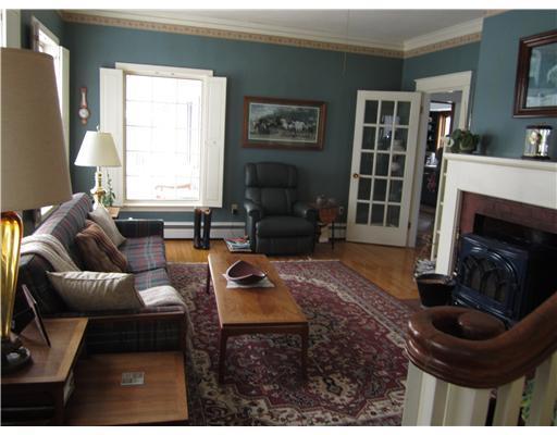 234 Conant Road Presque Isle, ME 04769 - Photo 7 of 19 Living Room. Handmade shutters for...