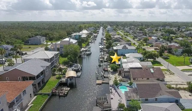 a stove top oven sitting inside of a kitchen
