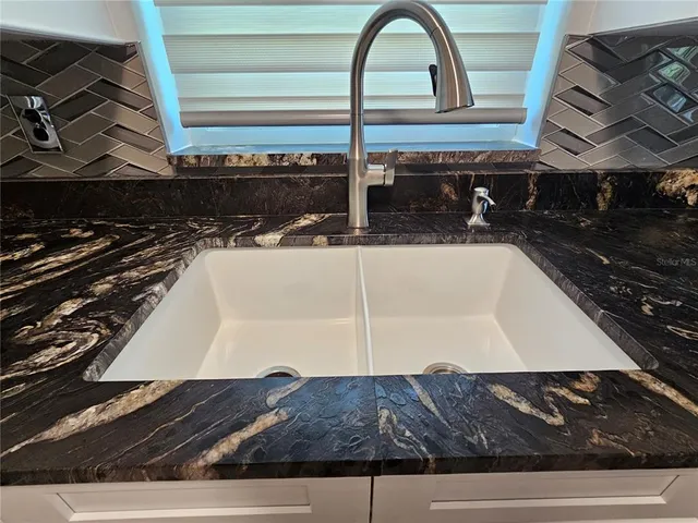 a view of a kitchen from a window