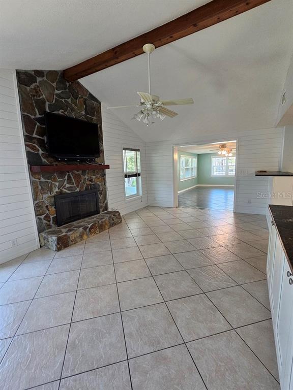7313 Hatteras Drive Hudson, FL 34667 - Photo 3 of 33 a view of livingroom with furniture flat screen tv and windows