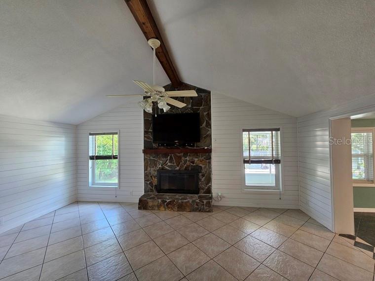 7313 Hatteras Drive Hudson, FL 34667 - Photo 4 of 33 an empty room with windows