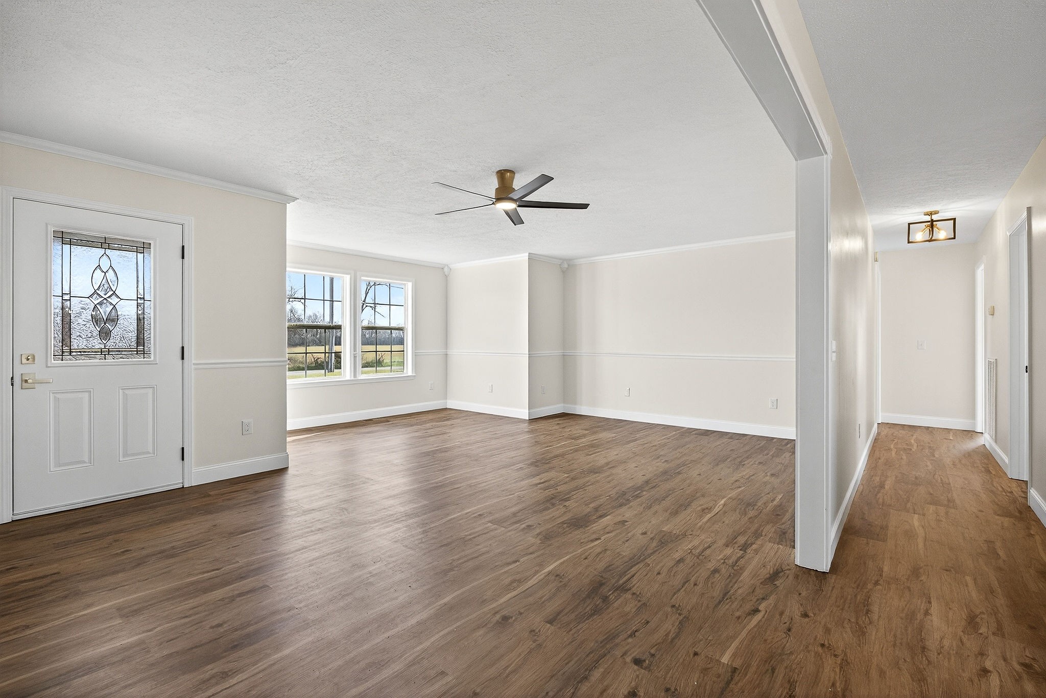 498 Low Gap Road Sparta, TN 38583 - Photo 16 of 38 wooden floor in an empty room with a window