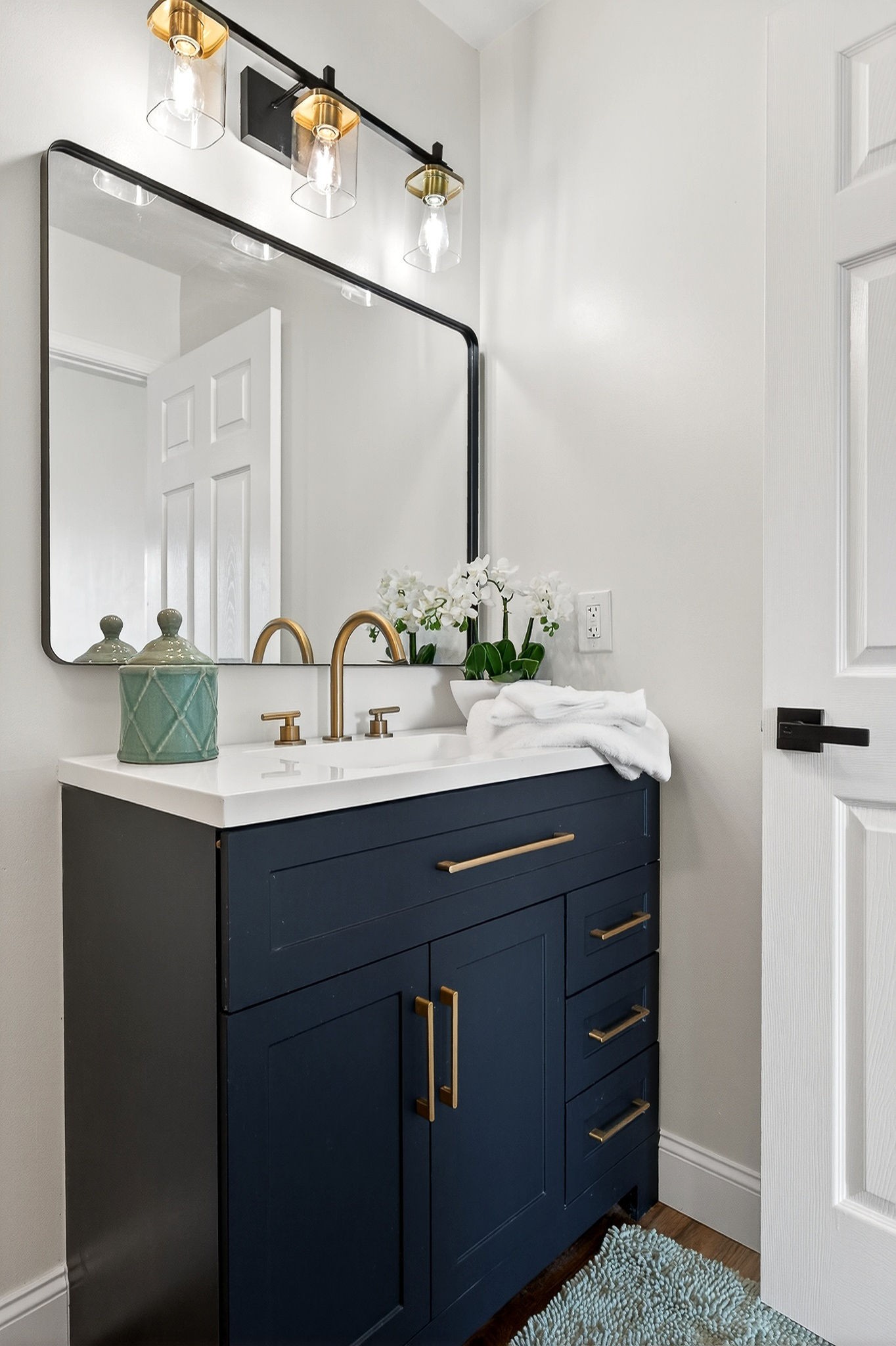 498 Low Gap Road Sparta, TN 38583 - Photo 18 of 38 a bathroom with a sink and a mirror