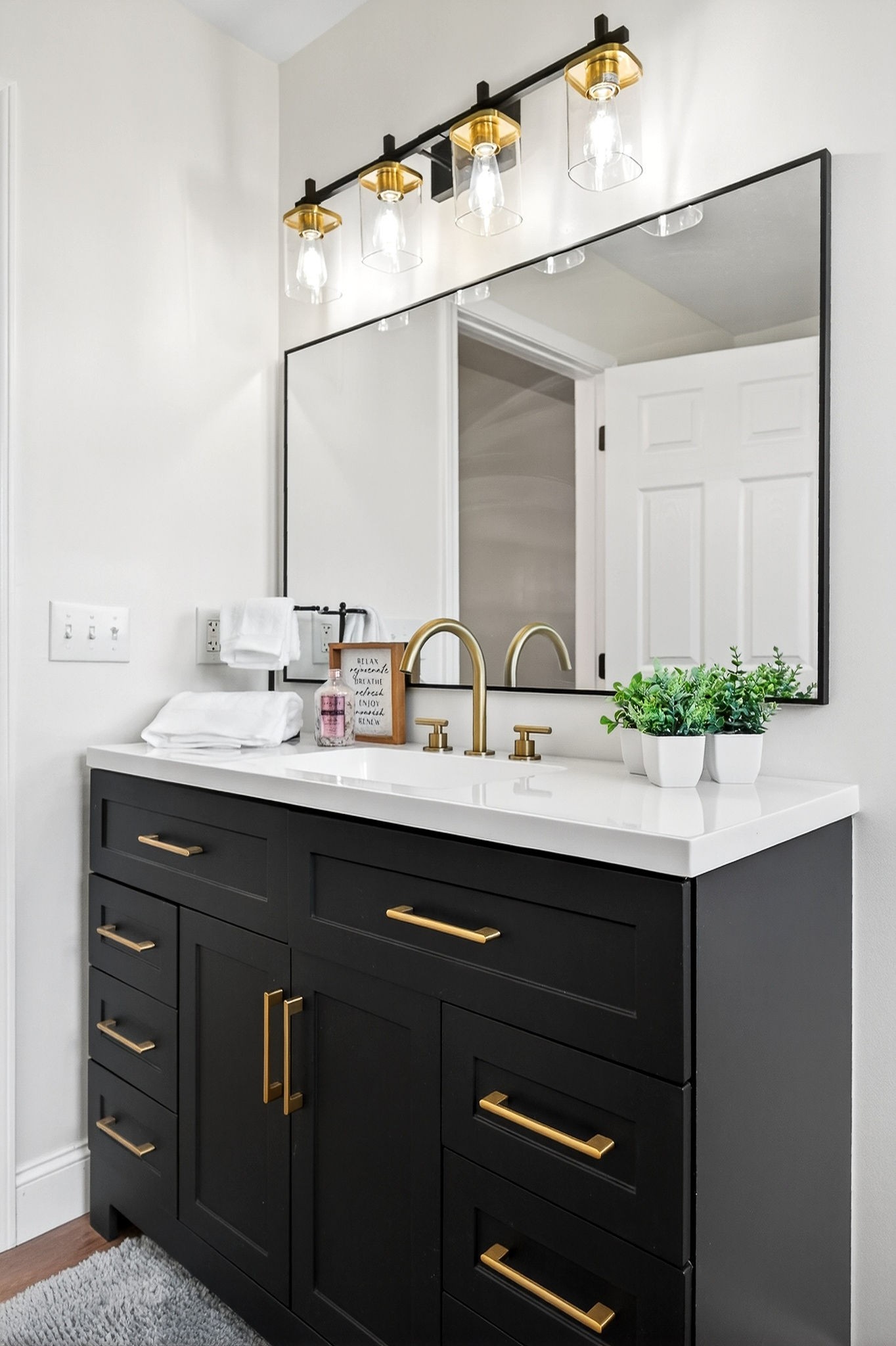 498 Low Gap Road Sparta, TN 38583 - Photo 22 of 38 a bathroom with a sink and a mirror