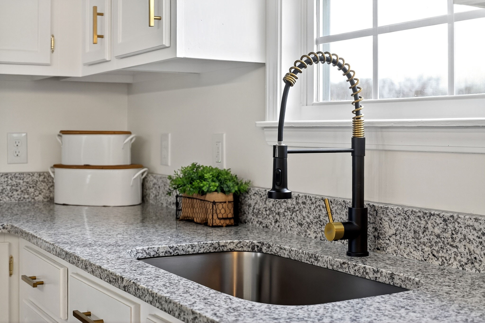 498 Low Gap Road Sparta, TN 38583 - Photo 10 of 38 a kitchen with a sink and white cabinets