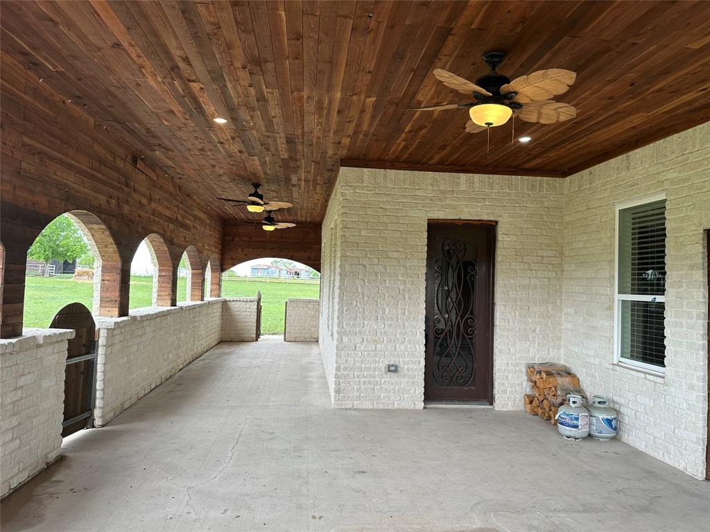 241 Gentry Road Ennis, TX 75119 - Photo 19 of 40 a view of lobby with furniture and chandelier