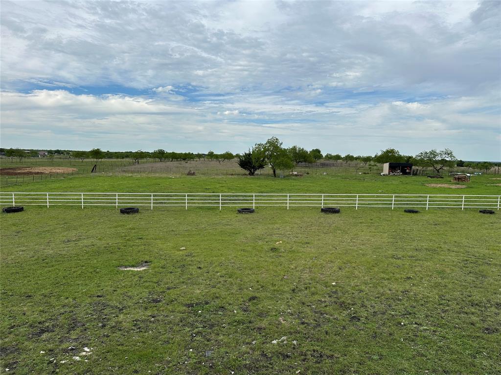 241 Gentry Road Ennis, TX 75119 - Photo 28 of 40 a view of an outdoor space and a lake view