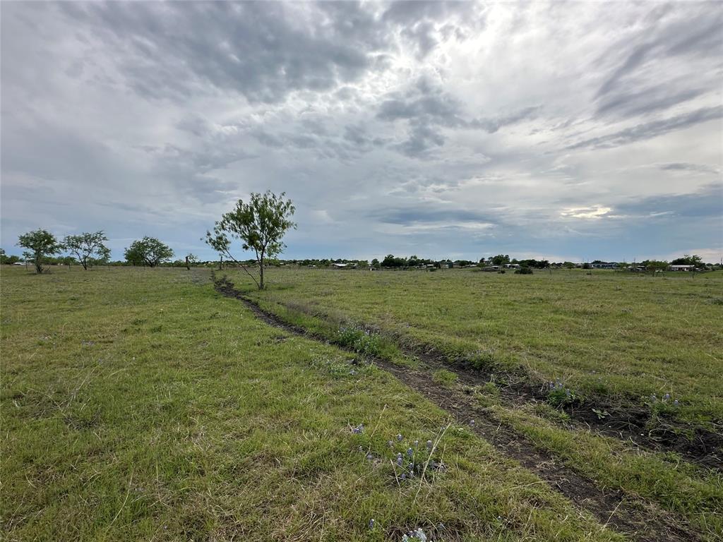 241 Gentry Road Ennis, TX 75119 - Photo 35 of 40 a view of a ocean with beach
