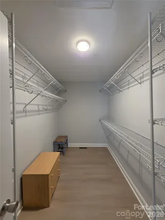 a view of a room with racks on the wall