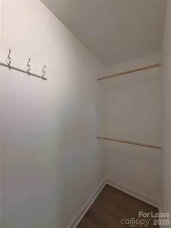 a view of a room with racks on the wall
