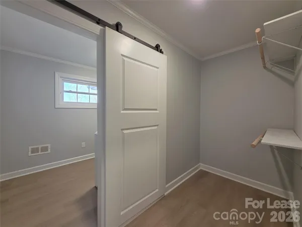 a view of a room with rack on the wall