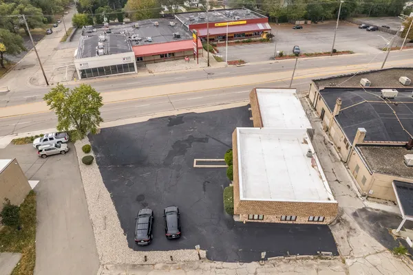 an aerial view of a house with a garden