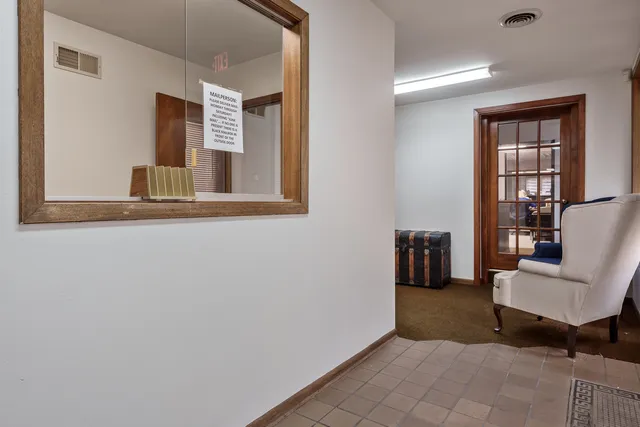 a view of a livingroom with couch and a couch