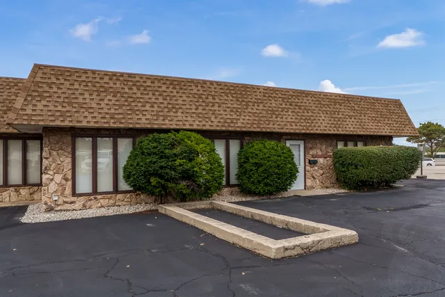 a front view of a house with porch