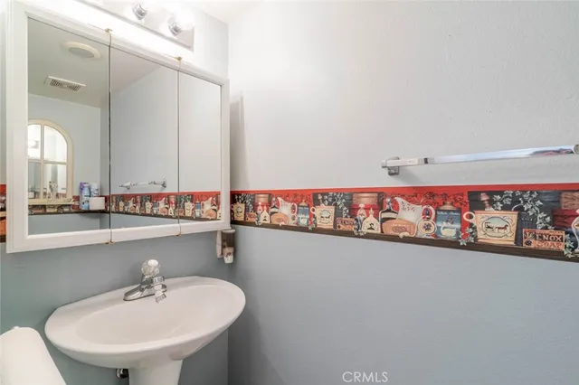 a workspace with furniture and lamp