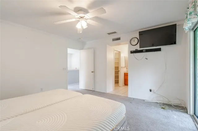 a bathroom with a granite countertop sink mirror and a shower