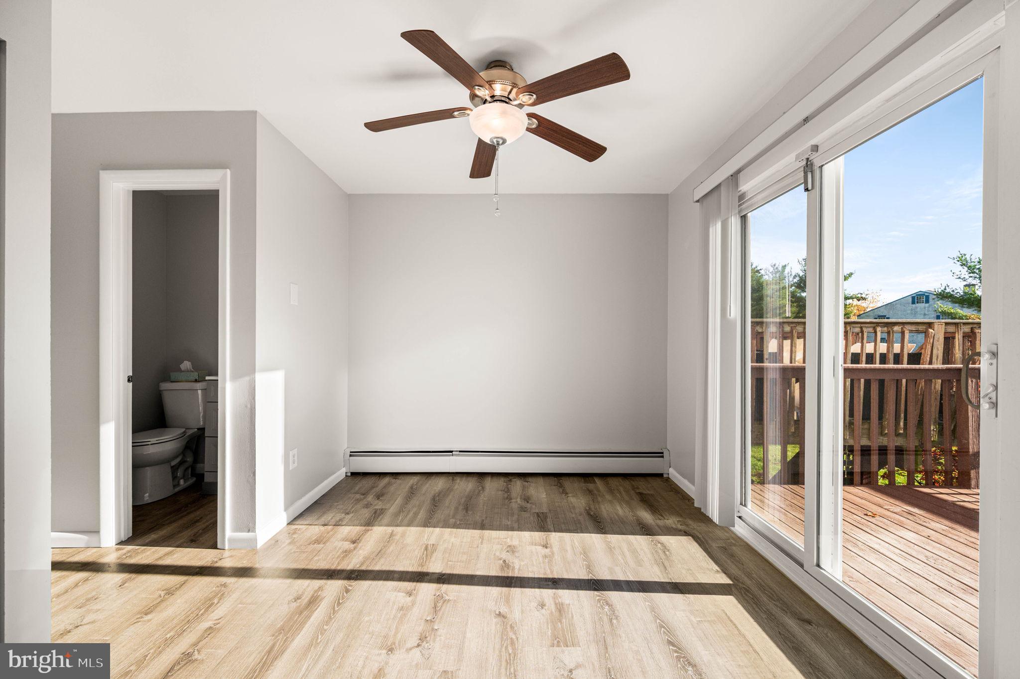 2404 Walnut Ridge Drive Pottstown, PA 19464 - Photo 11 of 24 a view of an empty room with glass door