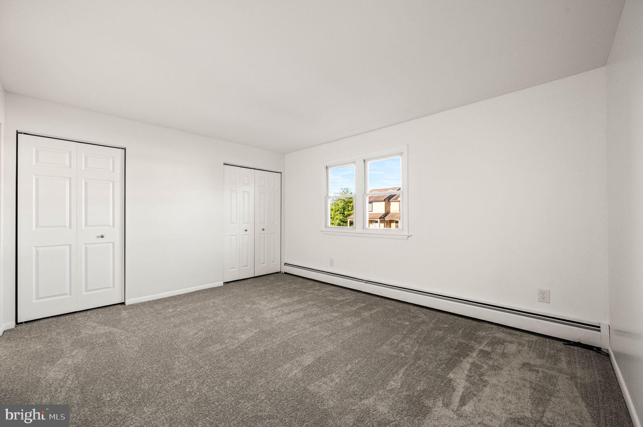 2404 Walnut Ridge Drive Pottstown, PA 19464 - Photo 13 of 24 an empty room with windows