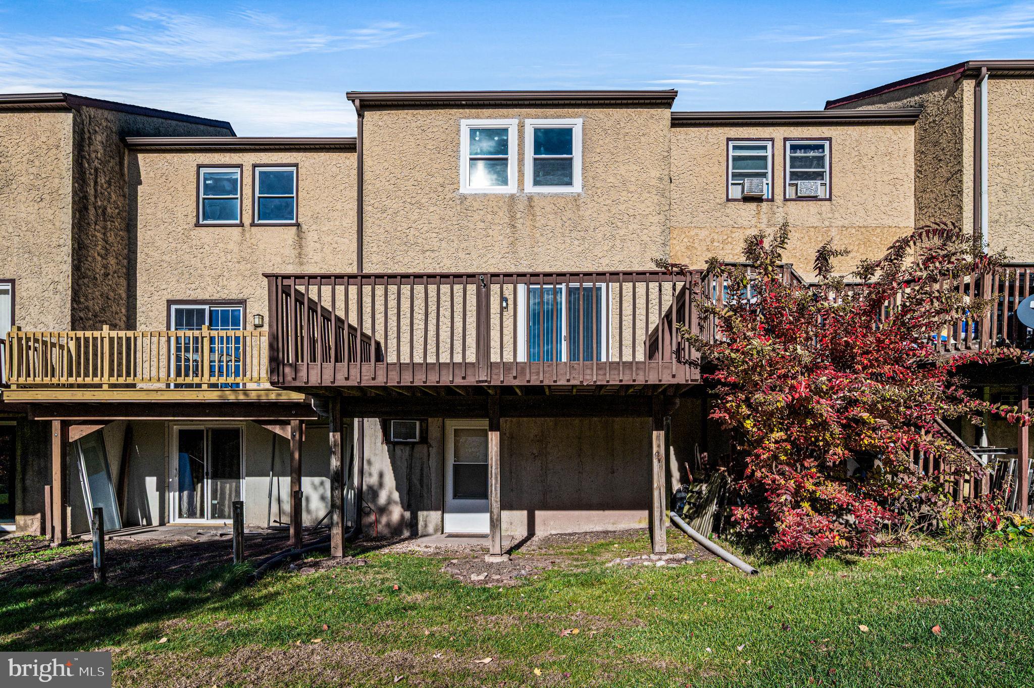 2404 Walnut Ridge Drive Pottstown, PA 19464 - Photo 21 of 24 a view of a house with backyard and sitting area