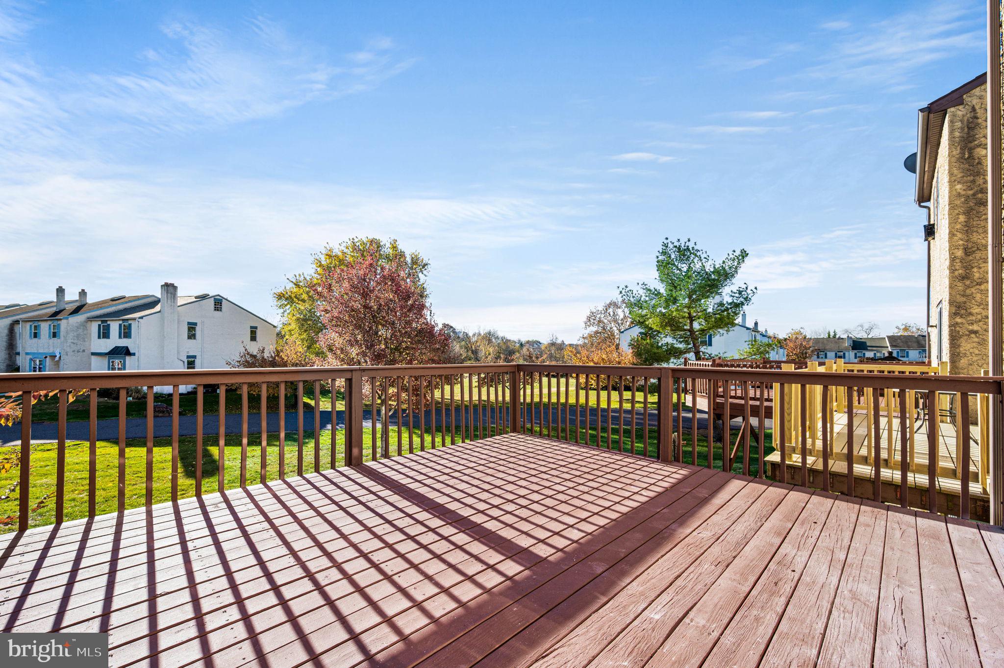 2404 Walnut Ridge Drive Pottstown, PA 19464 - Photo 22 of 24 a view of balcony with wooden floor and fence
