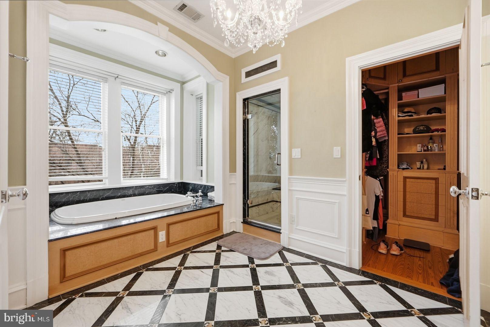 949 S Street Northwest Washington, DC 20001 - Photo 17 of 42 a spacious bathroom with a tub and shower