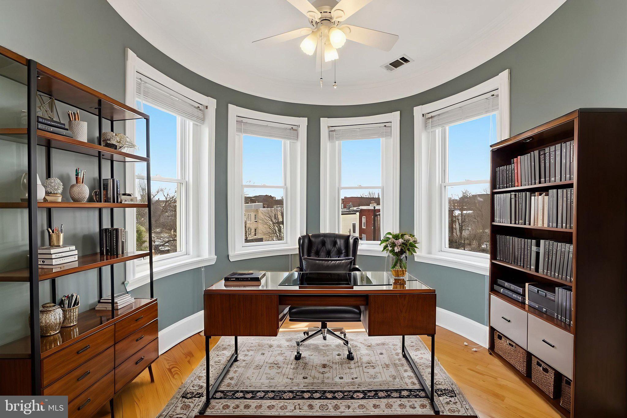 949 S Street Northwest Washington, DC 20001 - Photo 25 of 42 a living room with furniture a bookshelf and a window