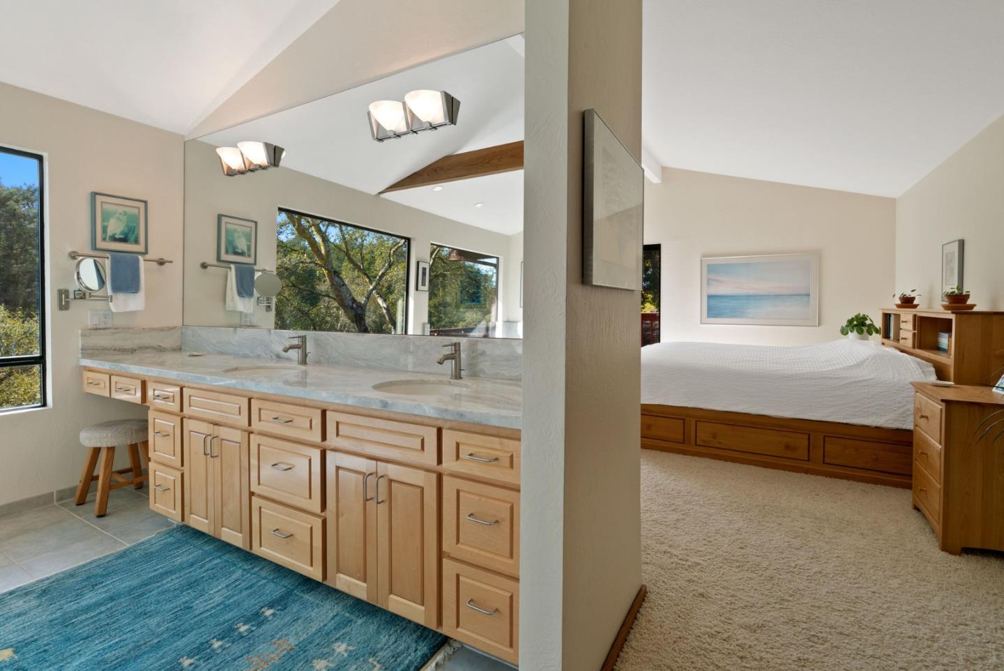 5310 Freedom Boulevard Aptos, CA 95003 - Photo 54 of 100 a bedroom with a bed a mirror and a dresser with wooden floor