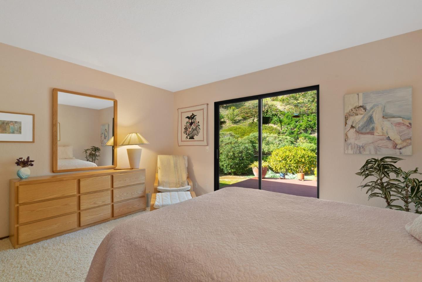 5310 Freedom Boulevard Aptos, CA 95003 - Photo 56 of 100 a bedroom with a bed and a dresser next to a window