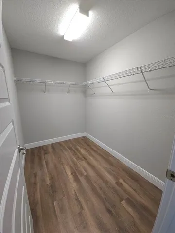 a view of a room with racks on the wall