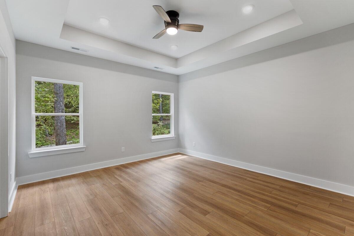 129 County Road 155 Riceville, TN 37370 - Photo 19 of 31 wooden floor in an empty room with a window