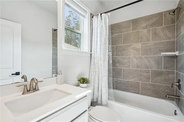 a bathroom with a sink and a bathtub