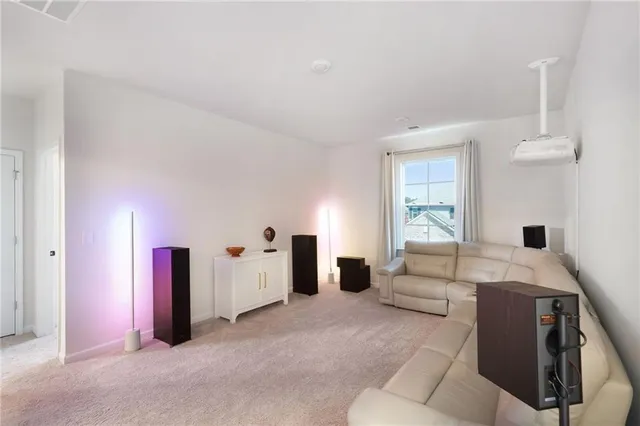 a living room with furniture and window