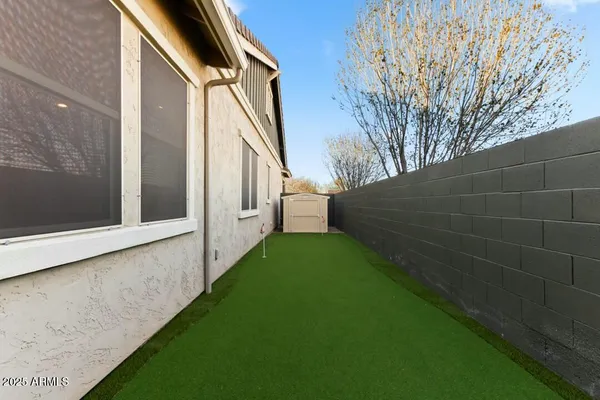 a backyard of a house with lots of green space